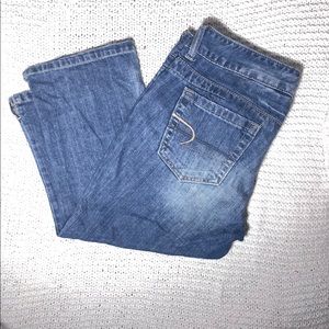 Slightly distressed light wash Capri jean